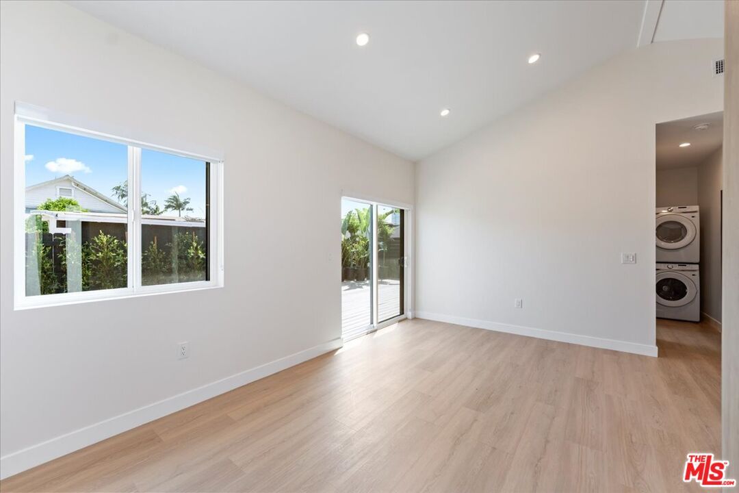 Empty room, Interior, Recessed Lighting, Utility Closets, Washer, Wood Texture Flooring