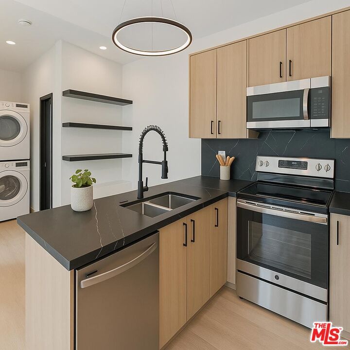 Interior, Kitchen, Pendant Lights, Recessed Lighting, Stainless Steel Appliances, Washer, Wood Texture Flooring