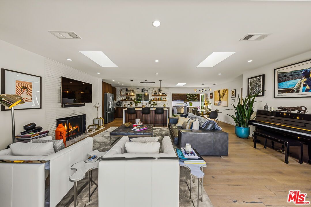 Fireplace, Interior, Kitchen, Living room, Pendant Lights, Piano, Recessed Lighting, Wood Texture Flooring