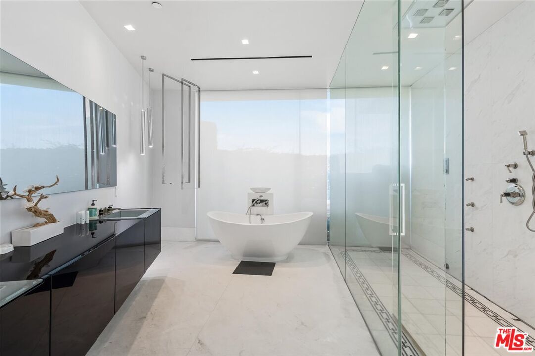 Bathroom, Dual Sink Vanities, Free Standing Baths, Glass Shower, Interior, Marble Walls, Recessed Lighting