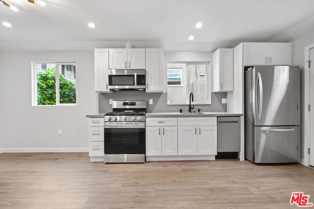 Interior, Kitchen, Recessed Lighting, Stainless Steel Appliances, Wood Texture Flooring