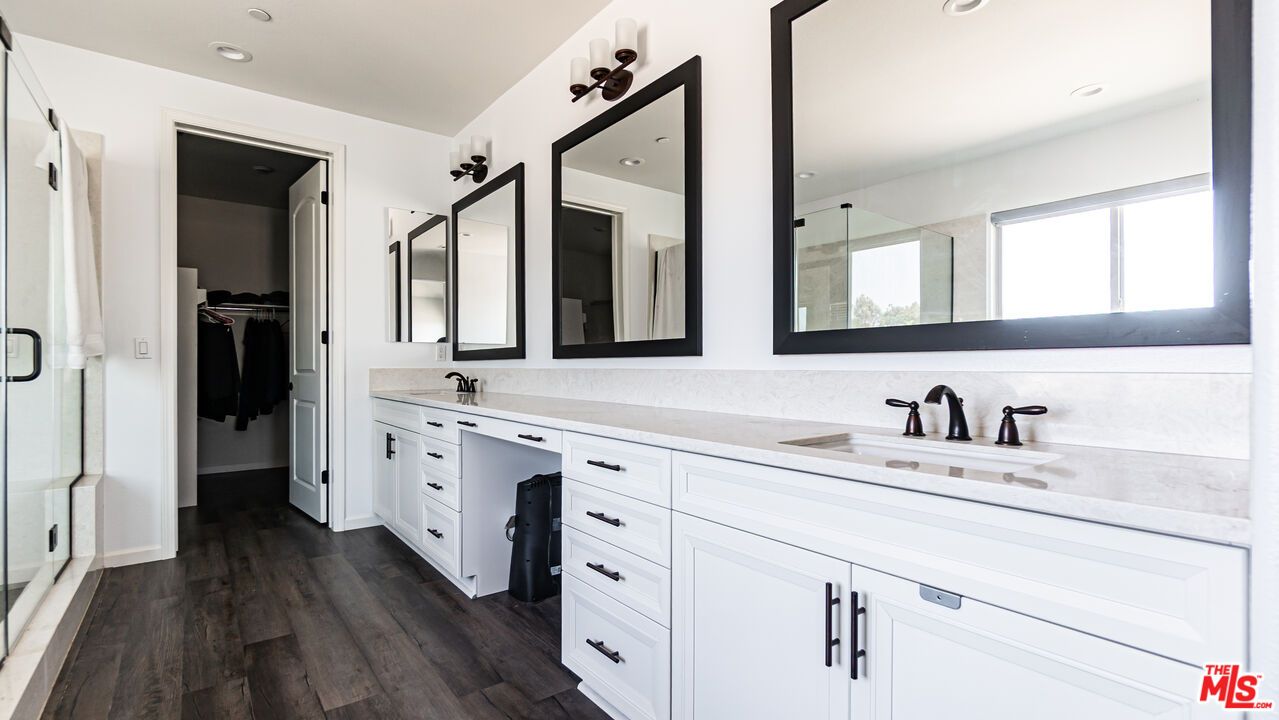 Bathroom, Dual Sink Vanities, Glass Shower, Interior, Recessed Lighting, Wood Texture Flooring