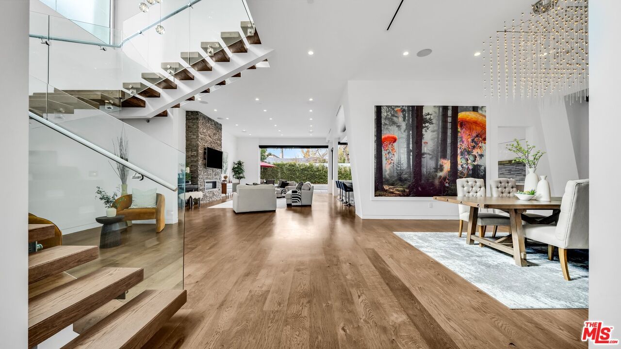 Dining room, Fireplace, Interior, Living room, Pendant Lights, Recessed Lighting, Wood Texture Flooring