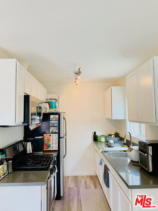 Interior, Kitchen, Tile Countertops, Wood Texture Flooring