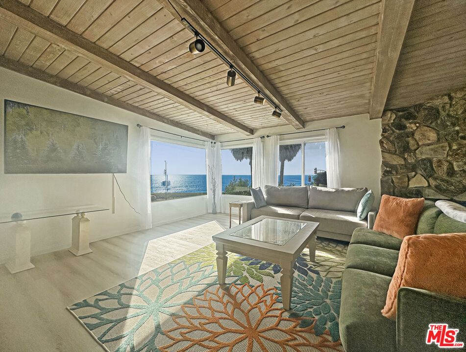 Fireplace, Interior, Living room, Stone Walls, Water, Wooden Beams, Wooden Ceilings, Wood Texture Flooring