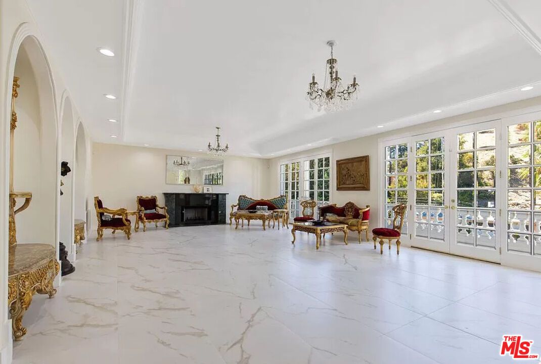 Chandelier, Fireplace, Interior, Living room, Marble, Recessed Lighting