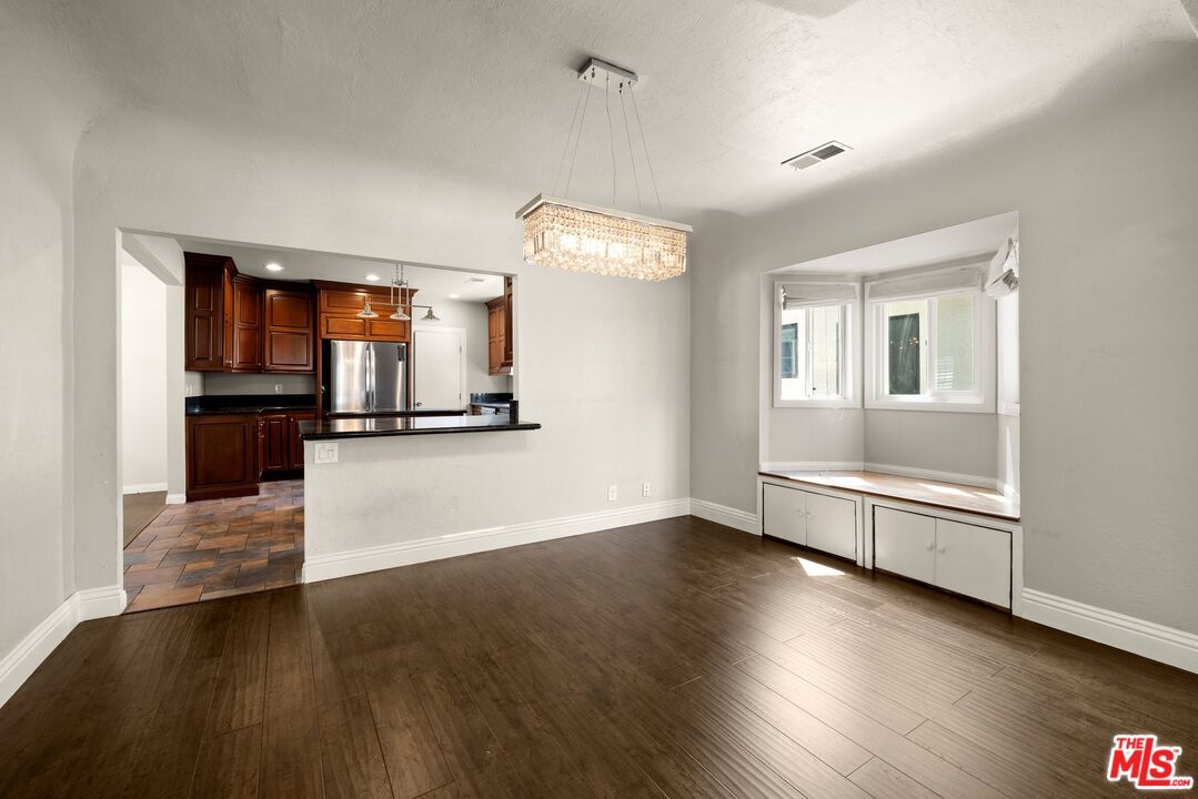 Chandelier, Interior, Kitchen, Pendant Lights, Recessed Lighting, Stainless Steel Appliances, Wood Texture Flooring