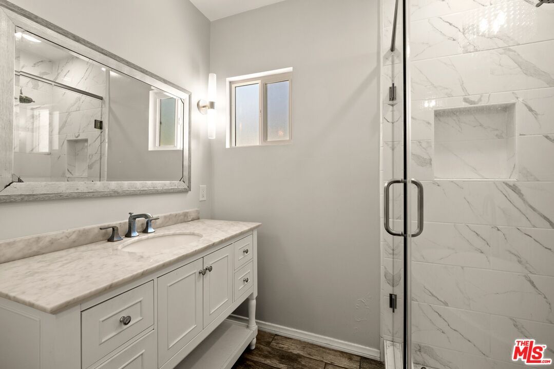 Bathroom, Glass Shower, Interior, Marble Walls, Wood Texture Flooring