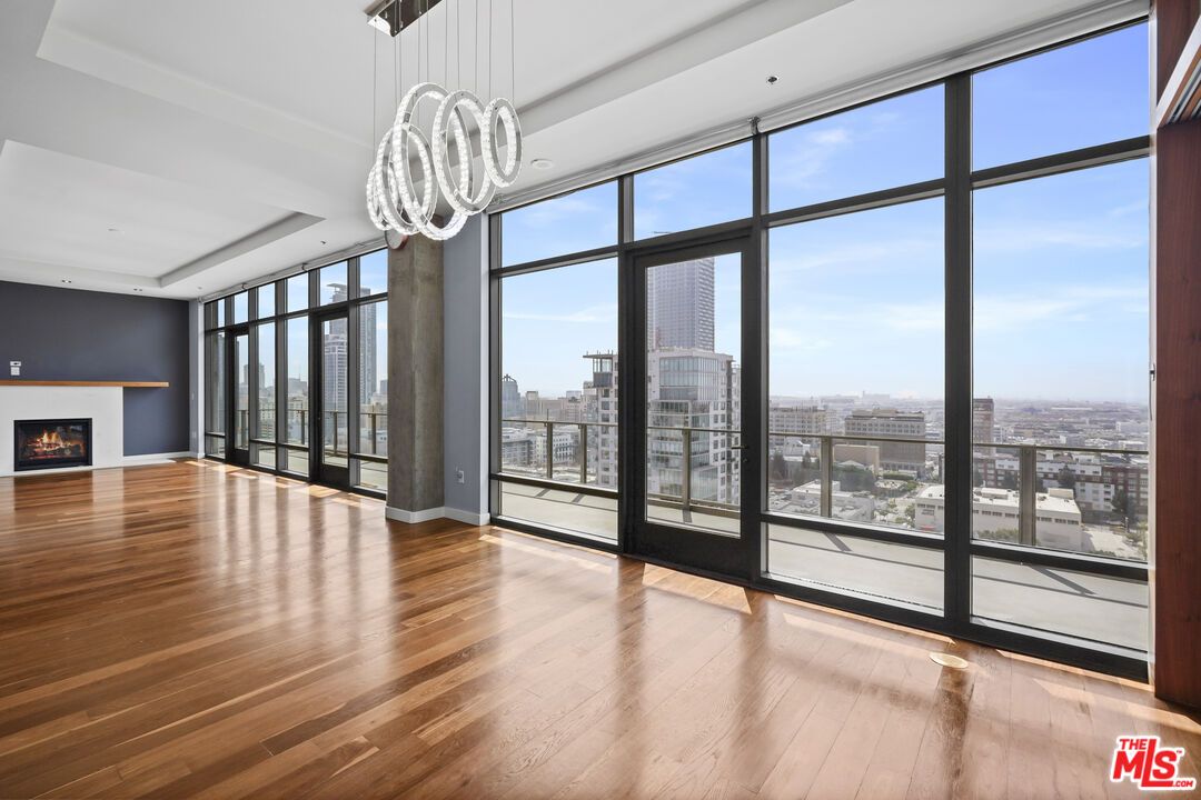 Empty room, Fireplace, Interior, Pendant Lights, Recessed Lighting, Wood Texture Flooring