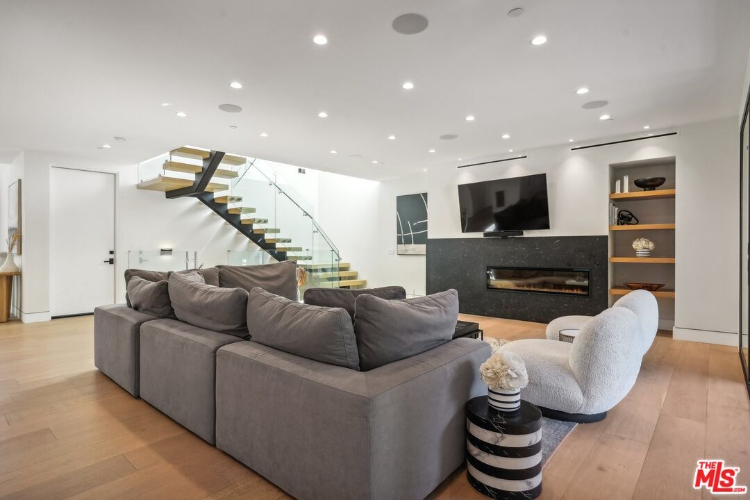 Fireplace, Interior, Living room, Recessed Lighting, Wood Texture Flooring