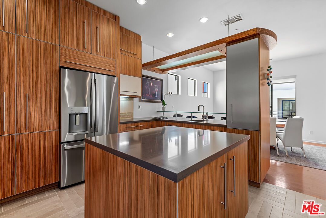Dining room, Interior, Kitchen, Recessed Lighting, Stainless Steel Appliances, Wood Texture Flooring