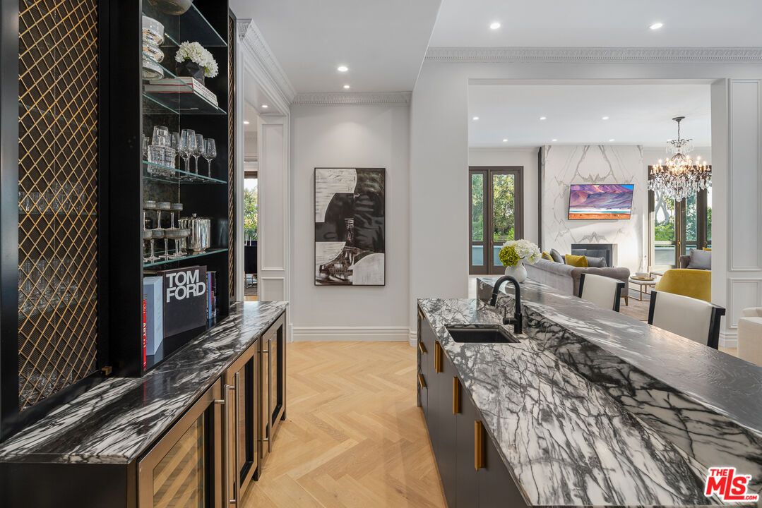 Chandelier, Fireplace, Interior, Kitchen, Marble Walls, Recessed Lighting, Wood Texture Flooring