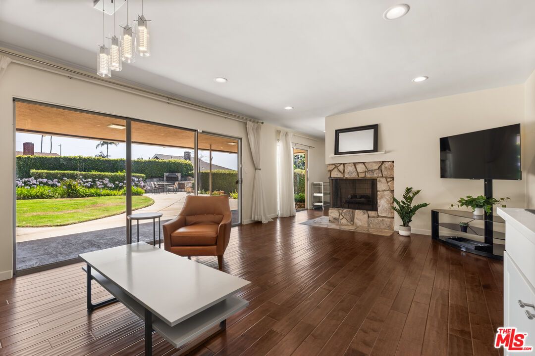 Fireplace, Interior, Pendant Lights, Recessed Lighting, Wood Texture Flooring