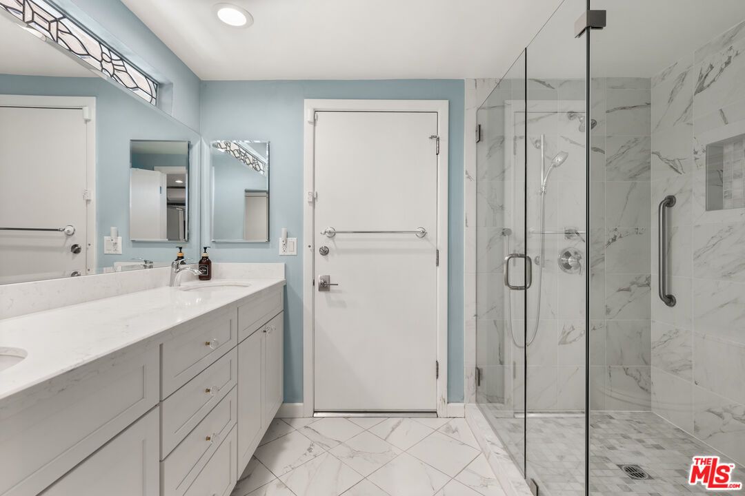 Bathroom, Dual Sink Vanities, Glass Shower, Interior, Marble, Marble Walls, Recessed Lighting