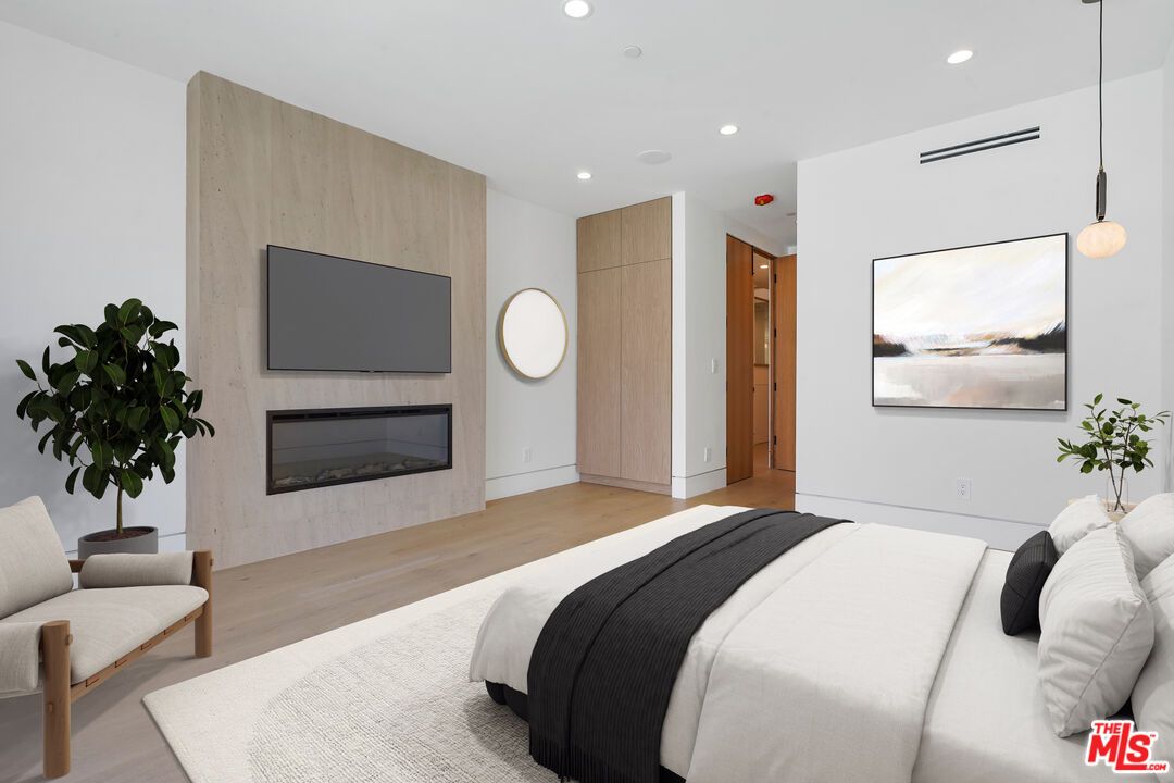 Bedroom, Fireplace, Interior, Pendant Lights, Recessed Lighting, Wood Texture Flooring