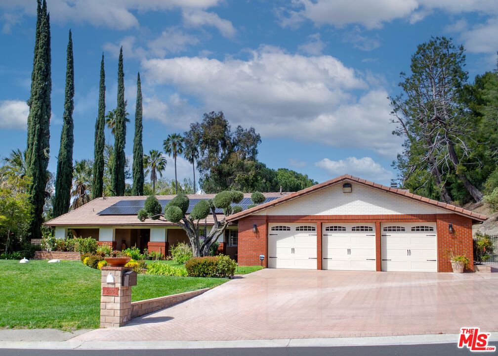 Attached, Exterior, Facade, Brick Facade, Solar Panels, Ranch