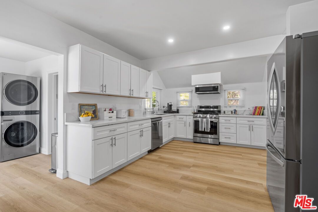 Interior, Kitchen, Recessed Lighting, Stainless Steel Appliances, Washer, Wood Texture Flooring