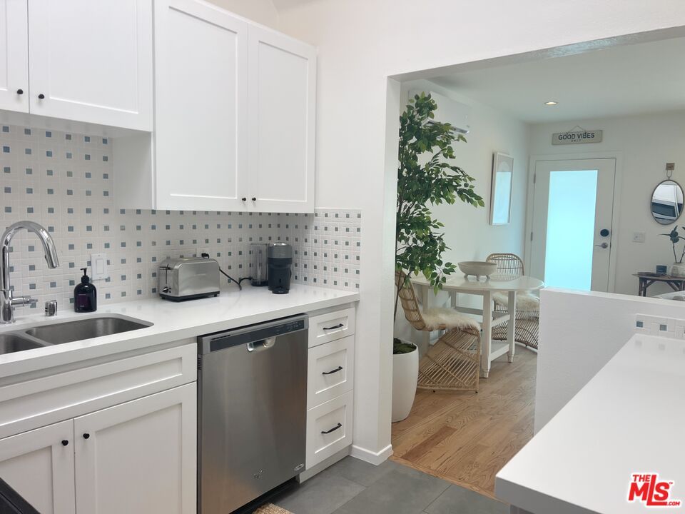 Dining room, Interior, Kitchen, Recessed Lighting, Stainless Steel Appliances, Wood Texture Flooring
