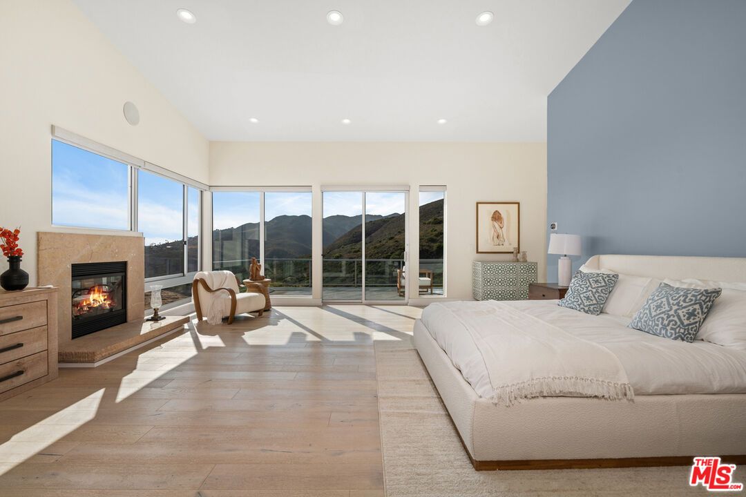 Bedroom, Fireplace, Interior, Recessed Lighting, Wood Texture Flooring