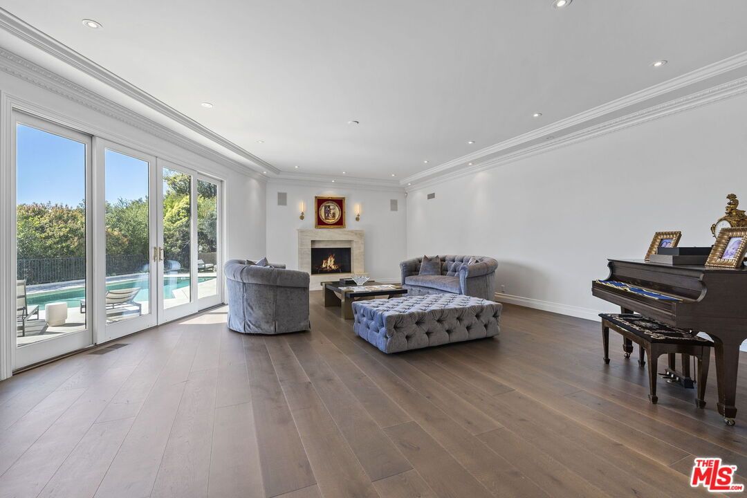 Fireplace, Interior, Living room, Piano, Recessed Lighting, Wood Texture Flooring