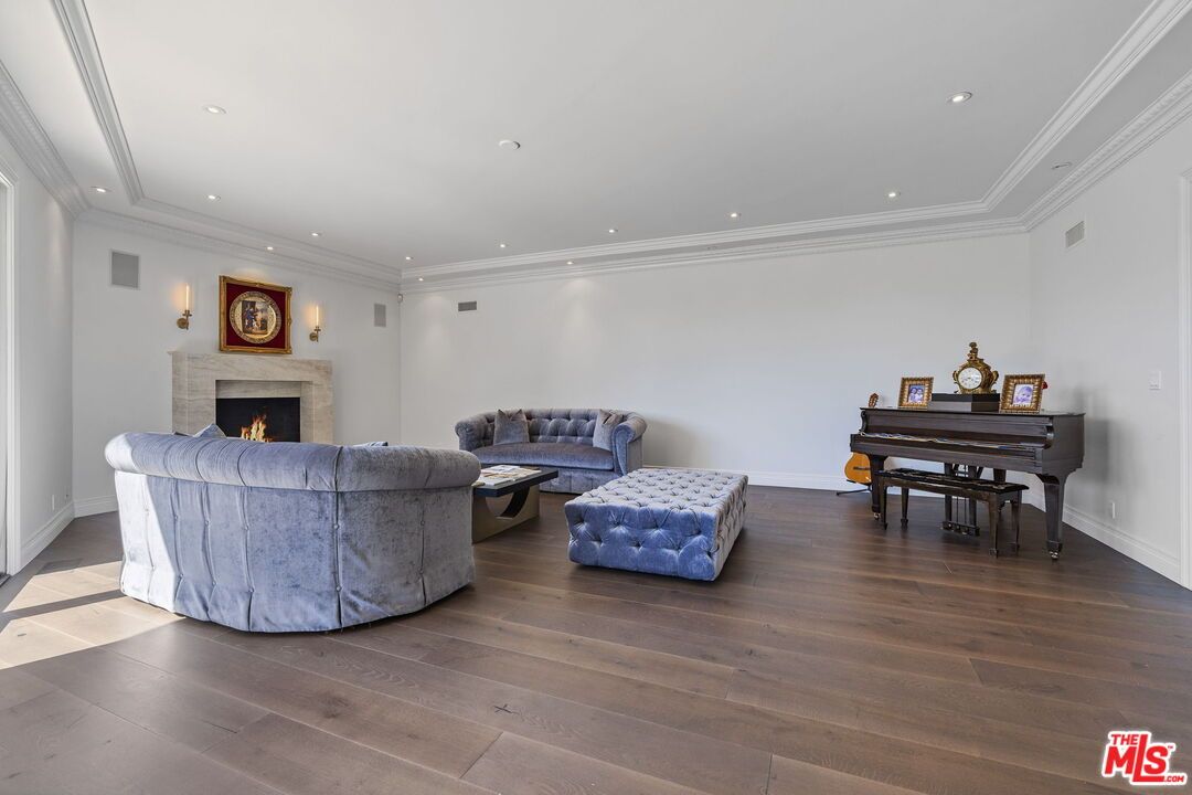 Fireplace, Interior, Living room, Piano, Recessed Lighting, Wood Texture Flooring