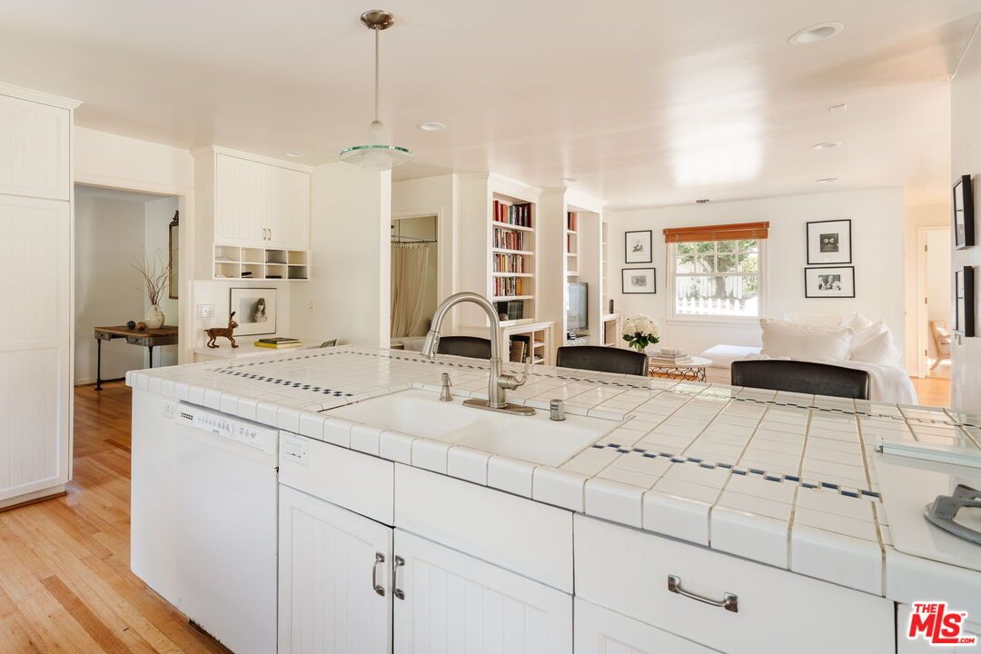 Interior, Kitchen, Pendant Lights, Recessed Lighting, Tile Countertops, Wood Texture Flooring