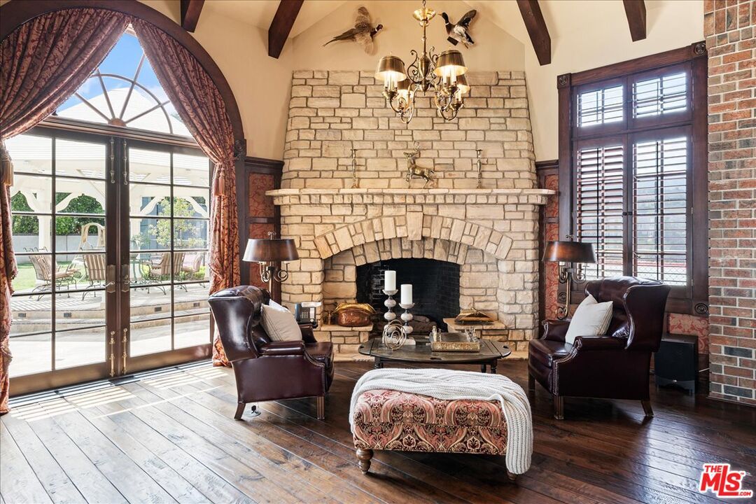 Chandelier, Fireplace, Interior, Living room, Stone Walls, Wooden Beams, Wood Texture Flooring