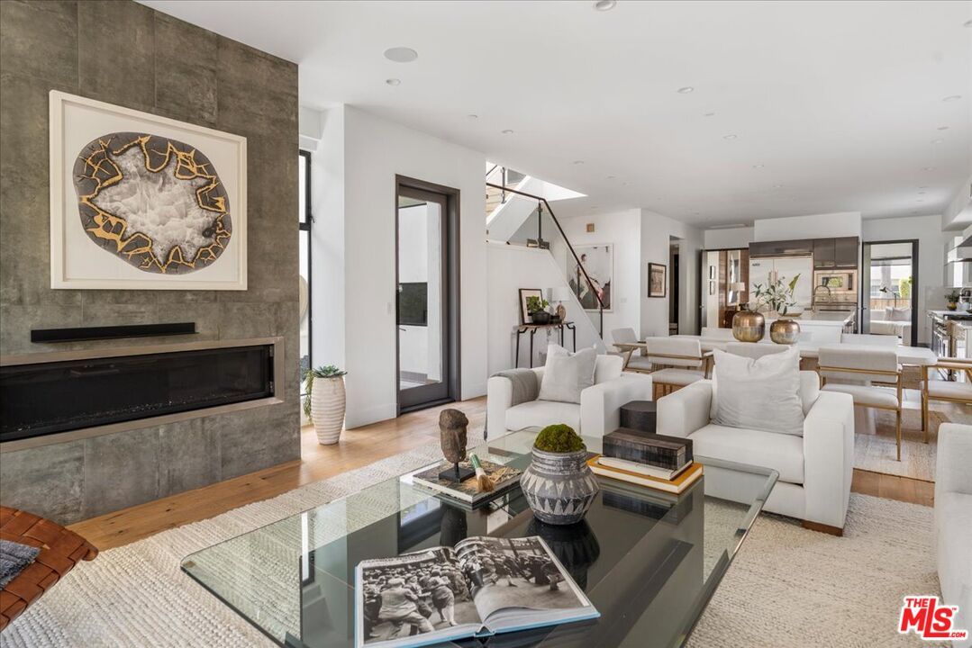 Dining room, Fireplace, Interior, Living room, Recessed Lighting, Wood Texture Flooring