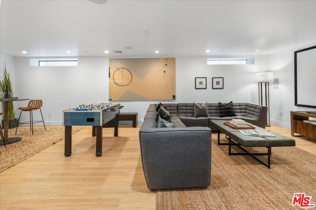 Game Room, Interior, Living room, Projection Screen, Recessed Lighting, Wood Texture Flooring