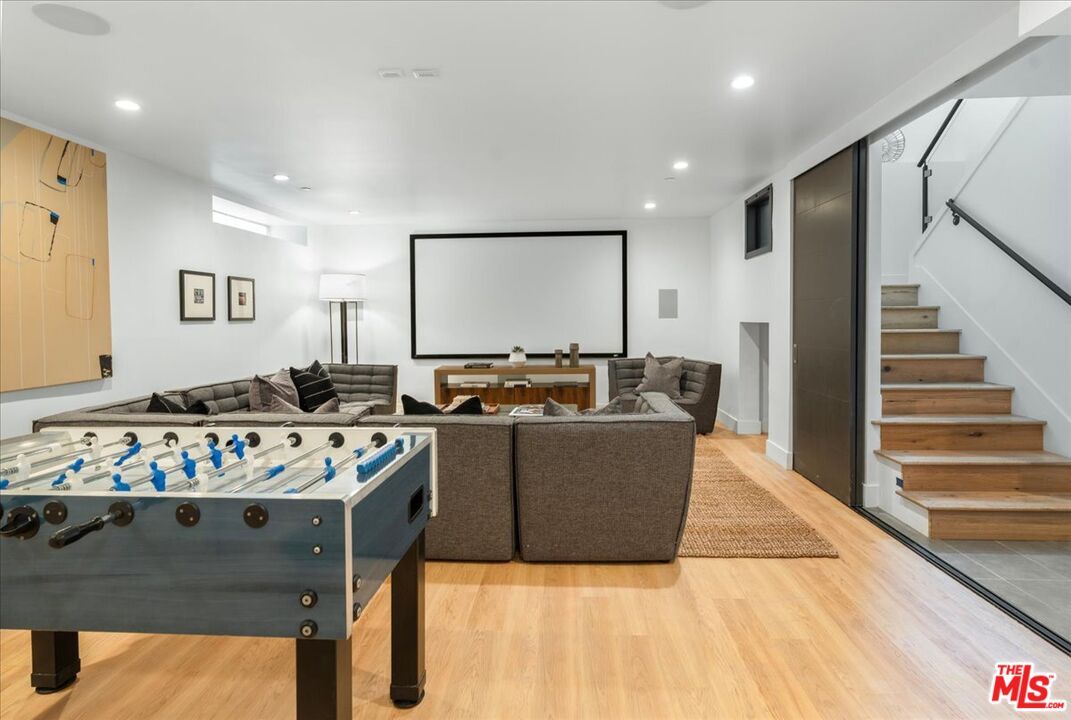Game Room, Interior, Living room, Projection Screen, Recessed Lighting, Wood Texture Flooring