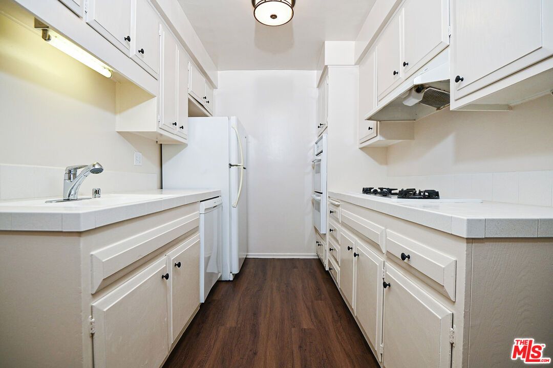 Interior, Kitchen, Tile Countertops, Wood Texture Flooring