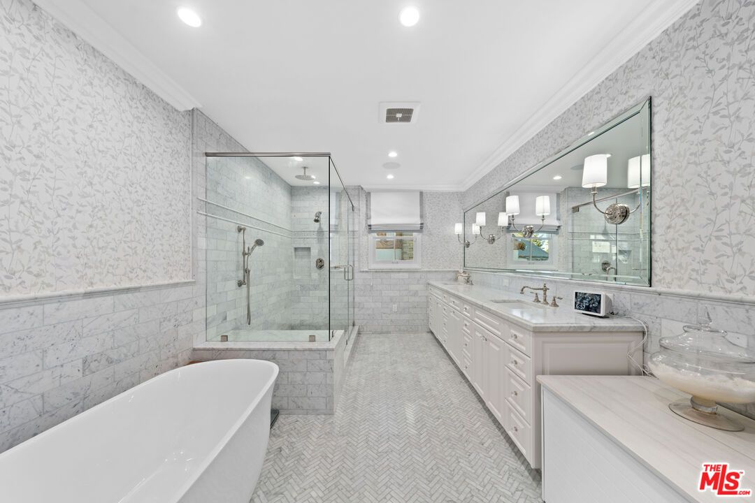 Bathroom, Dual Sink Vanities, Free Standing Baths, Glass Shower, Interior, Marble Walls, Recessed Lighting