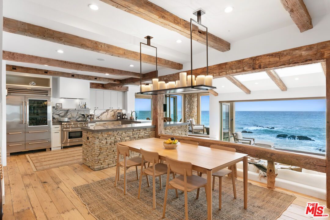 Chandelier, Dining room, Interior, Kitchen, Recessed Lighting, Stainless Steel Appliances, Water, Wooden Beams, Wood Texture Flooring