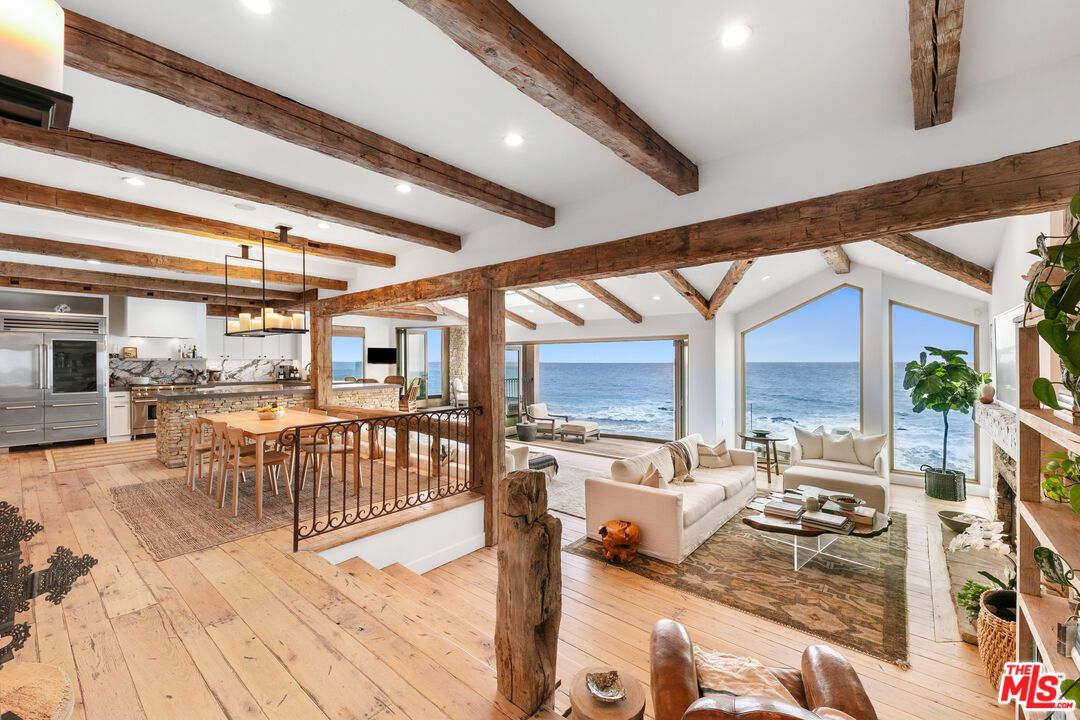 Dining room, Fireplace, Interior, Kitchen, Living room, Pendant Lights, Recessed Lighting, Stainless Steel Appliances, Water, Wooden Beams, Wood Texture Flooring