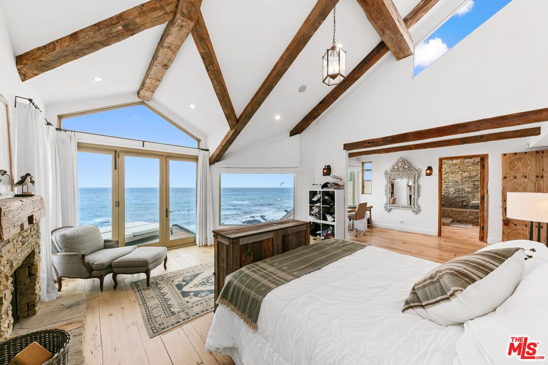 Bedroom, Fireplace, Interior, Pendant Lights, Recessed Lighting, Water, Wooden Beams, Wood Texture Flooring