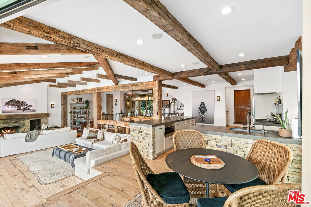 Dining room, Fireplace, Interior, Living room, Recessed Lighting, Wooden Beams, Wood Texture Flooring