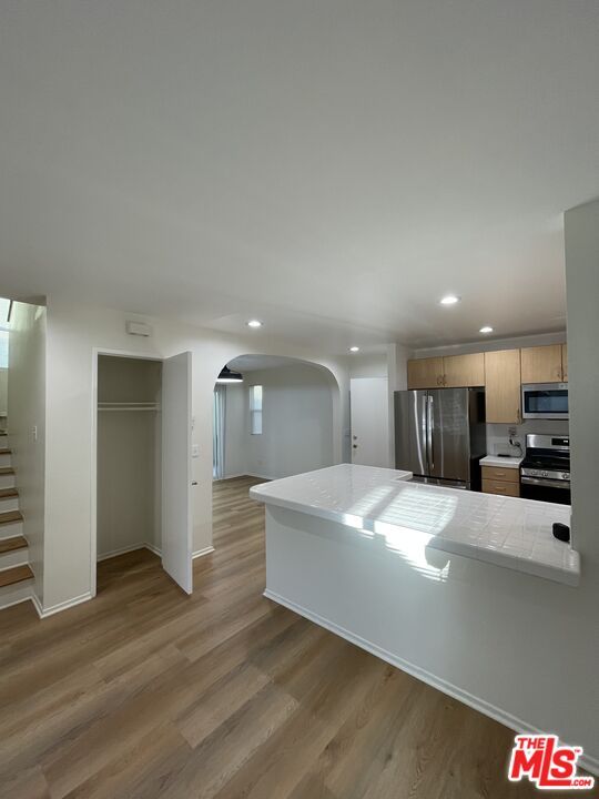 Interior, Kitchen, Recessed Lighting, Stainless Steel Appliances, Wood Texture Flooring