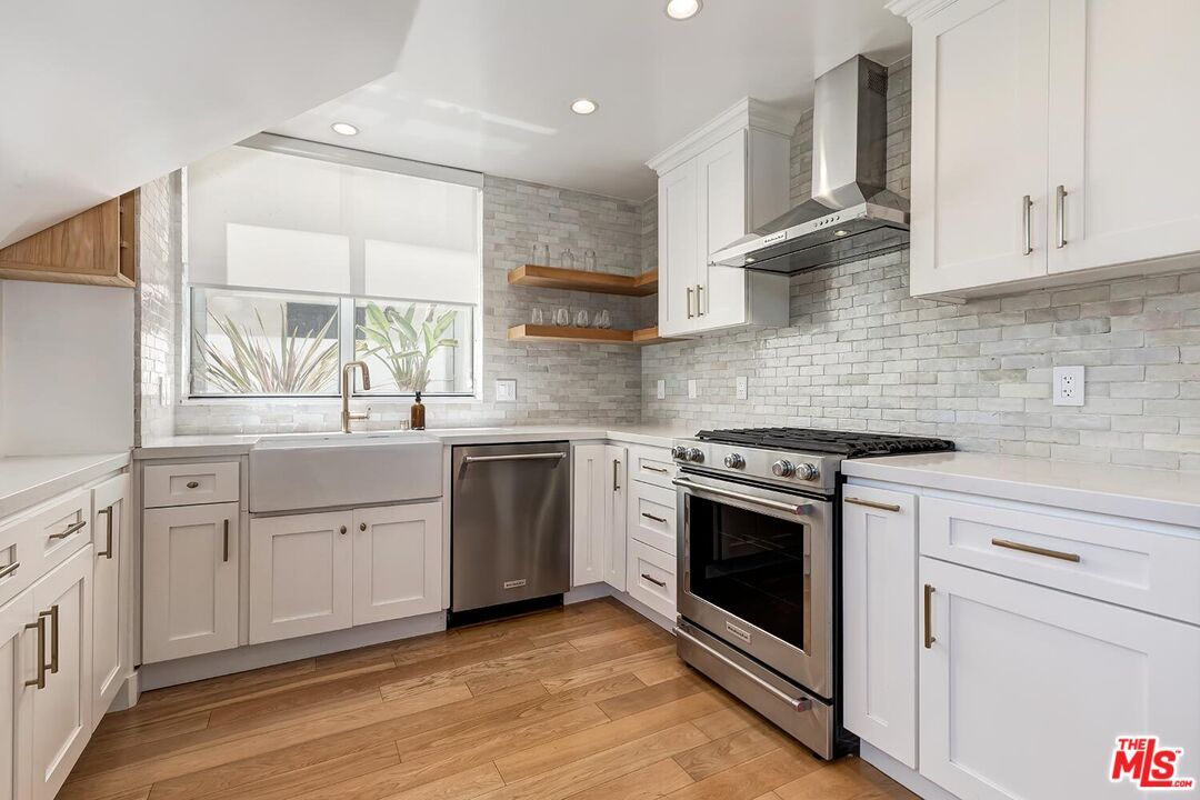 Interior, Kitchen, Recessed Lighting, Stainless Steel Appliances, Stone Walls, Wood Texture Flooring