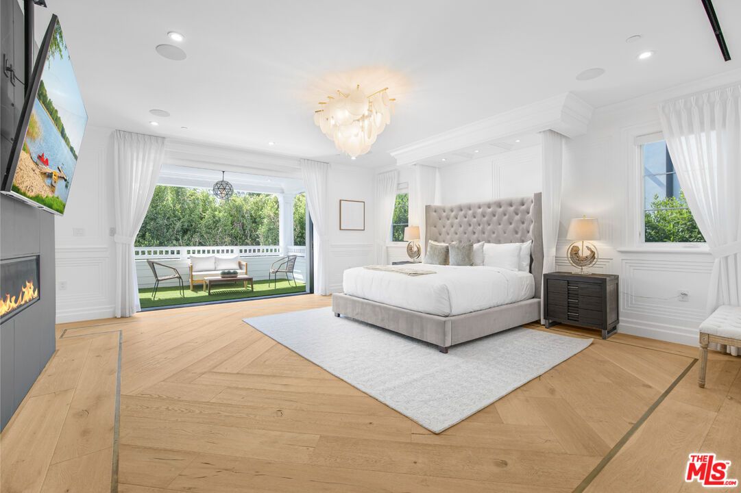 Bedroom, Chandelier, Fireplace, Interior, Recessed Lighting, Wood Texture Flooring