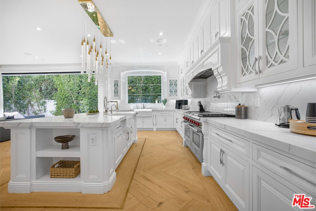 Interior, Kitchen, Marble Walls, Pendant Lights, Recessed Lighting, Stainless Steel Appliances, Wood Texture Flooring