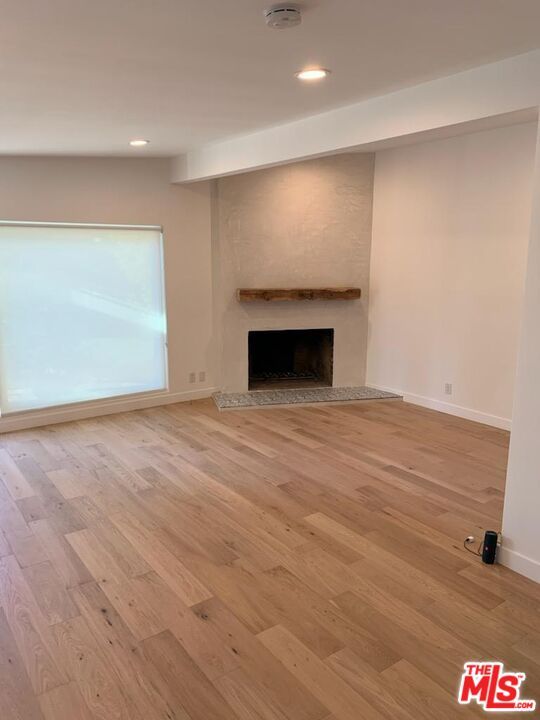 Empty room, Fireplace, Interior, Recessed Lighting, Wood Texture Flooring