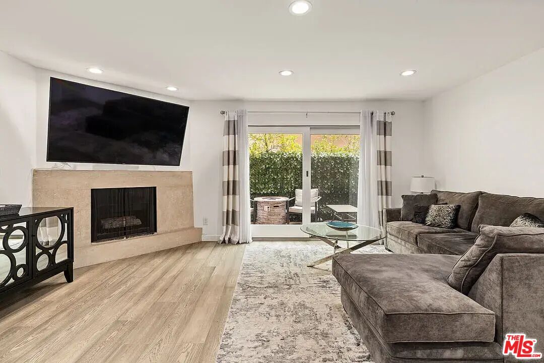 Fireplace, Interior, Living room, Recessed Lighting, Wood Texture Flooring