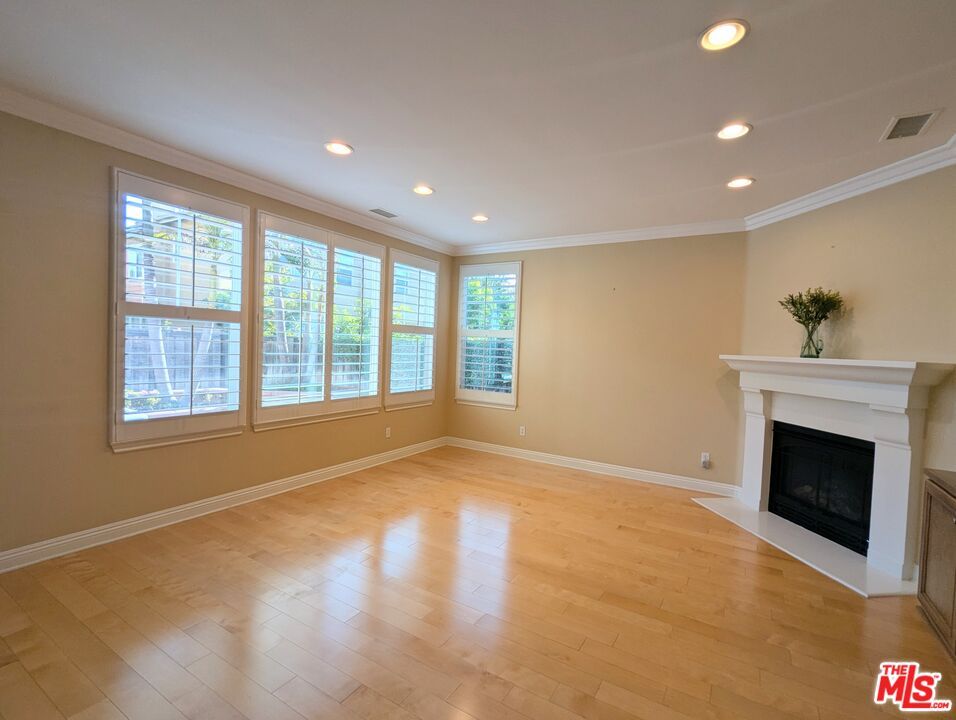 Empty room, Fireplace, Interior, Recessed Lighting, Wood Texture Flooring
