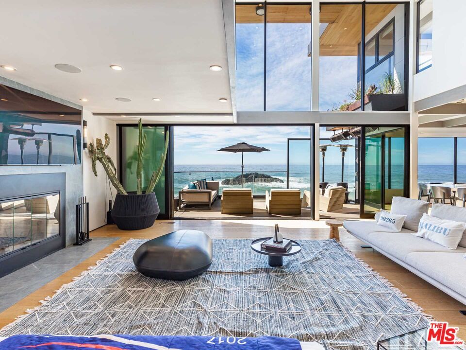 Fireplace, Interior, Living room, Recessed Lighting, Water, Wood Texture Flooring