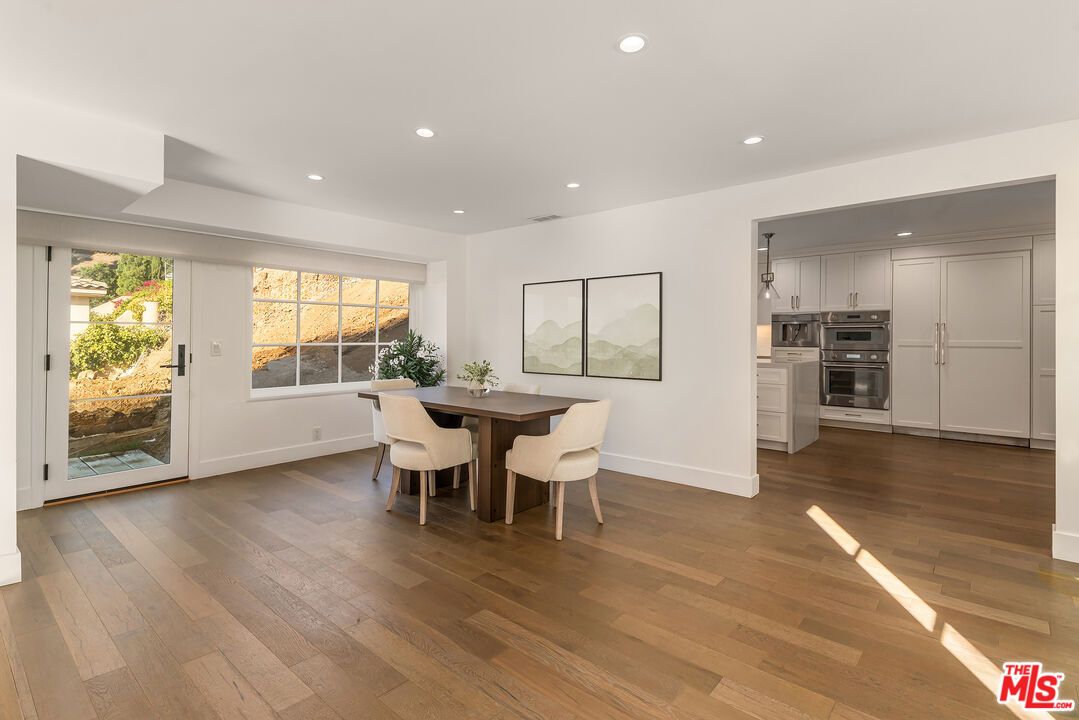 Dining room, Interior, Kitchen, Recessed Lighting, Stainless Steel Appliances, Wood Texture Flooring