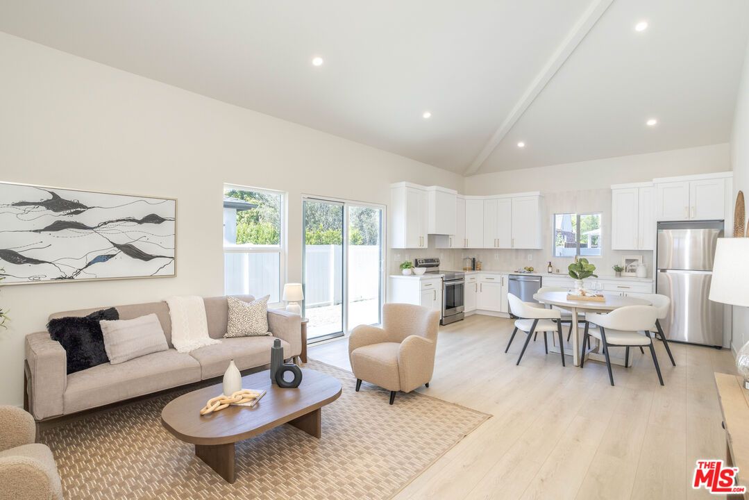 Dining room, Interior, Kitchen, Living room, Recessed Lighting, Stainless Steel Appliances, Wood Texture Flooring