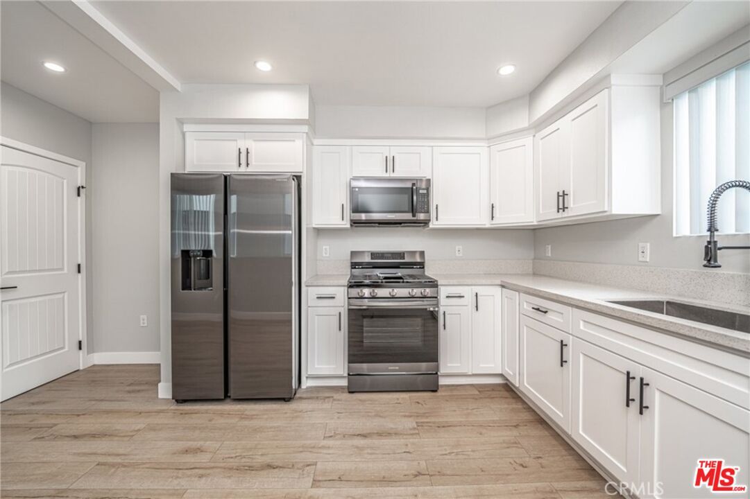 Interior, Kitchen, Recessed Lighting, Stainless Steel Appliances, Wood Texture Flooring