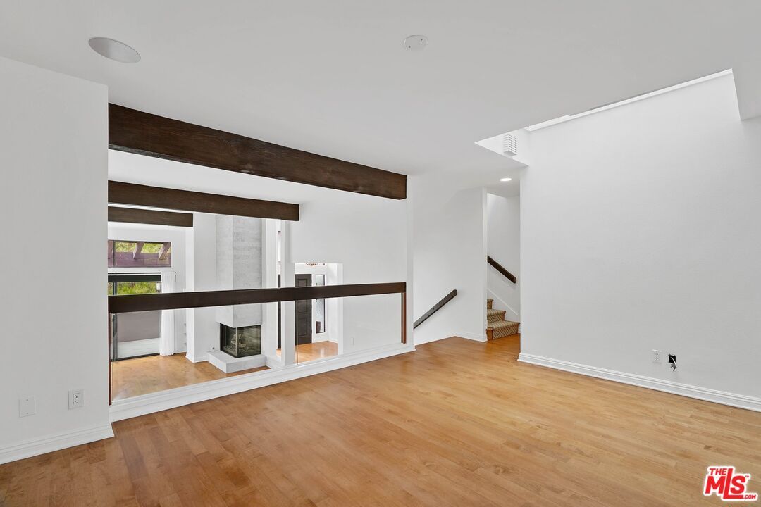 Empty room, Fireplace, Interior, Recessed Lighting, Wooden Beams, Wood Texture Flooring