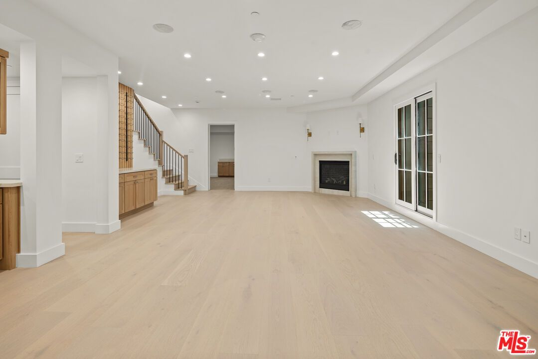 Empty room, Fireplace, Interior, Recessed Lighting, Wood Texture Flooring