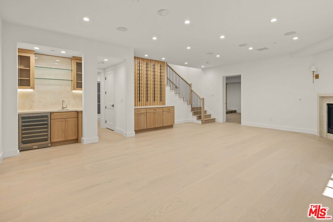 Empty room, Fireplace, Interior, Recessed Lighting, Wood Texture Flooring